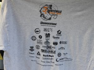 Gray t-shirt featuring "Graniteville Fishing Rodeo 2024" logo at the top. Below, various sponsor logos including Bridgestone, InaSol, Central States, and more are displayed in rows.