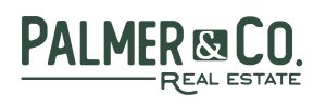 Logo for Palmer & Co. Real Estate. The text is in green with a modern sans-serif font. "Palmer & Co." is prominently displayed, with "Real Estate" in smaller letters below. A horizontal line extends from the "P" in "Palmer.
